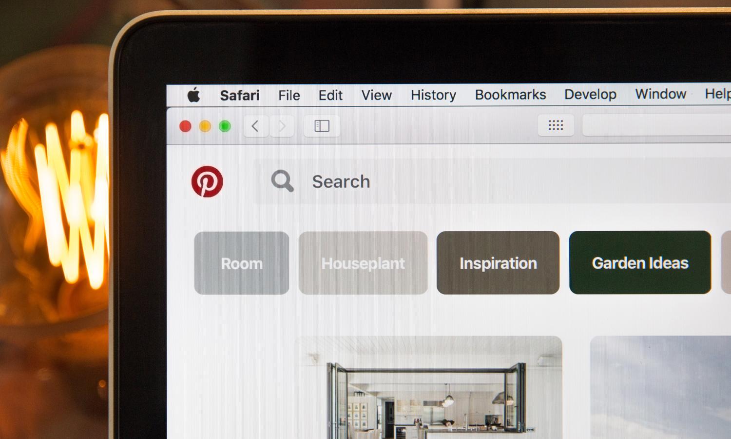 A laptop with its browser opened on Pinterest.
